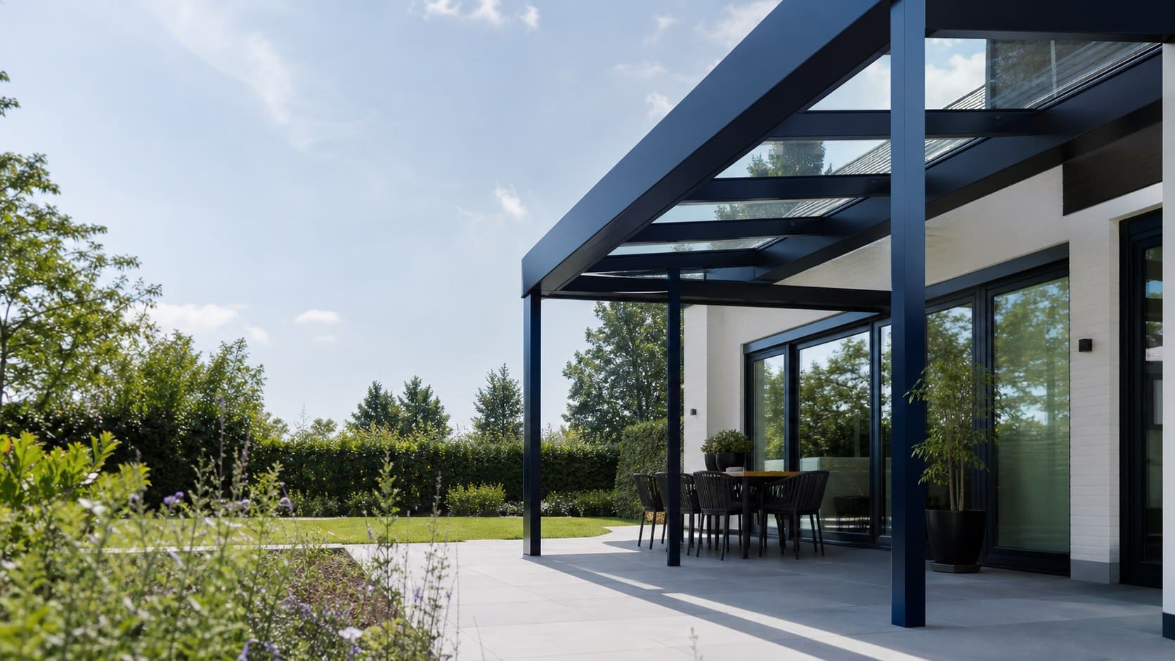 Modern aluminium veranda beside a bright garden